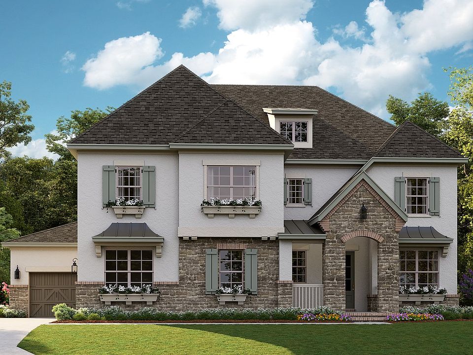 Tiburon C - French Cottage 3-Car Side Load Garage Note Renderings may show optional features