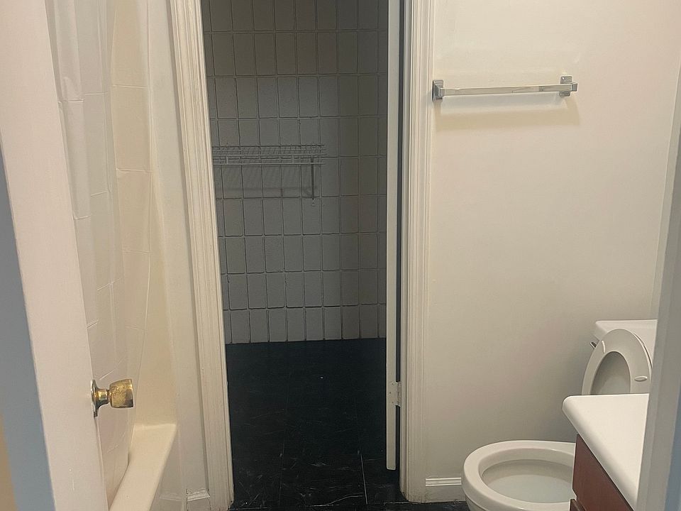 bathroom with walk in closet