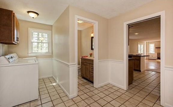 Tile mud room with laundry