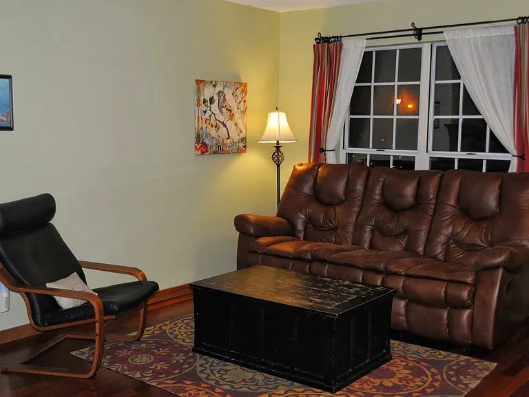 Mainfloor living room from another angle (with frontyard facing window).
