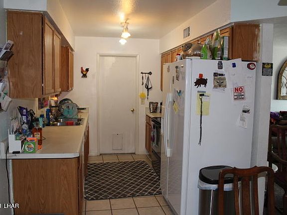 4th image of 2441 Smoketree Ave N