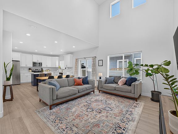 Open-concept living room with vaulted ceilings