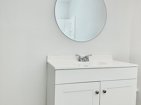 Bathroom vanity and light fixture
