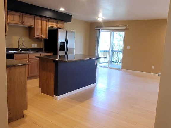 Kitchen Island to dining and balcony