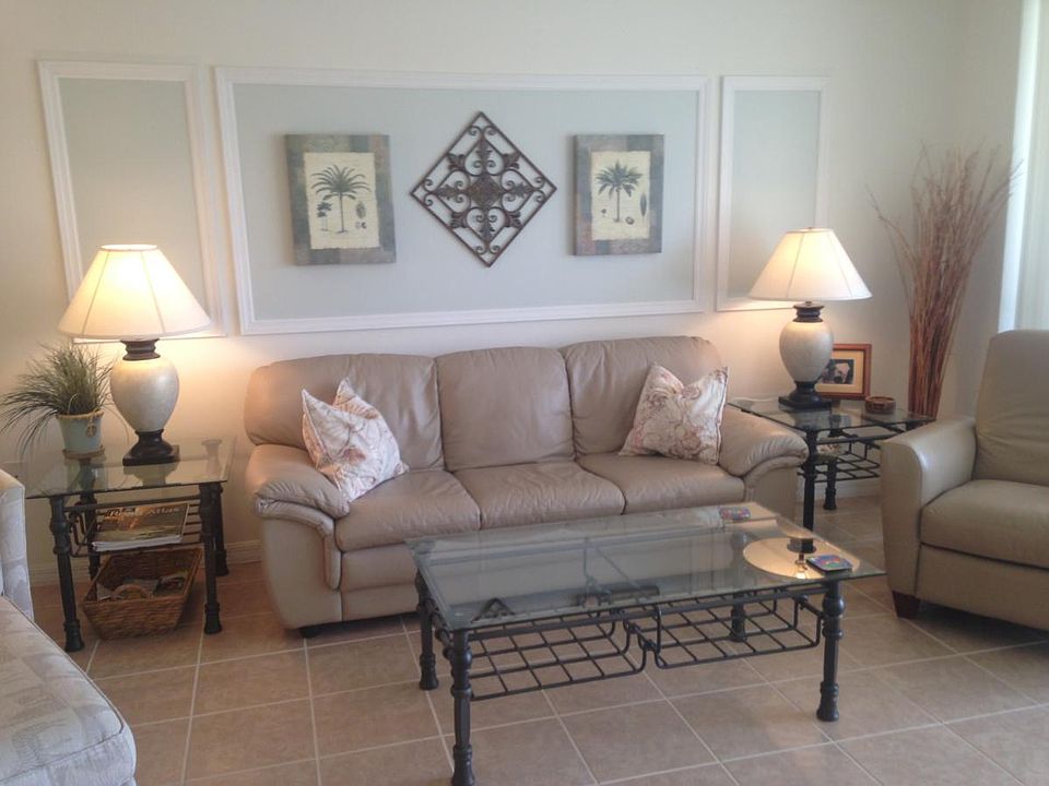 Living Room with 12' glass door to the lanai