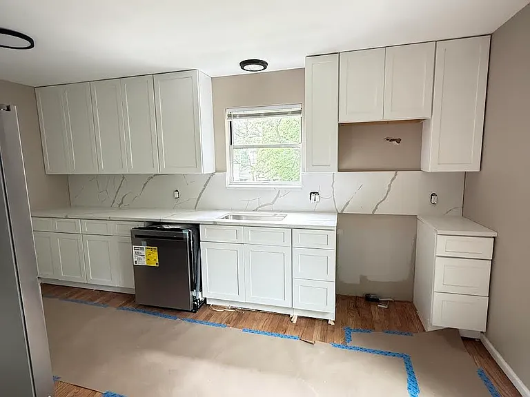 mid renovation. everything is done just didn't get a picture yet ;)
All new appliances!