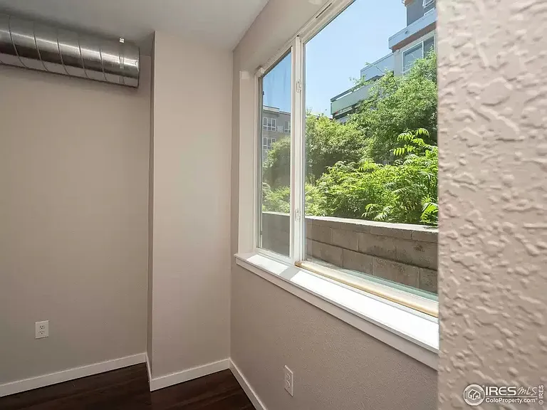 Large Bedroom with Back Courtyard View
