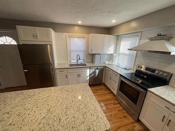 Includes dishwasher, range hood, and garbage disposal.