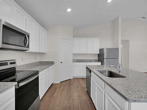 Enjoy the upgraded kitchen that includes stainless steel appliances