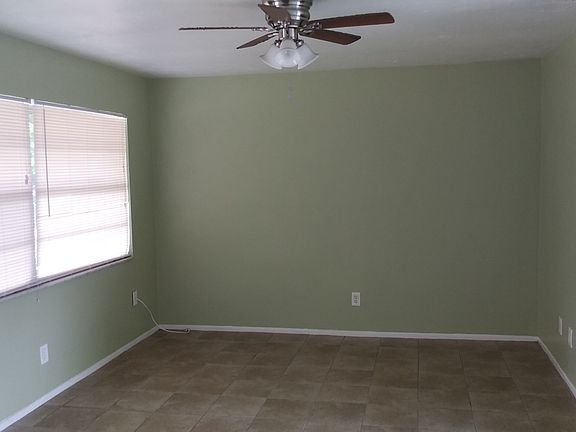 Living room and bedrooms have ceiling fans.