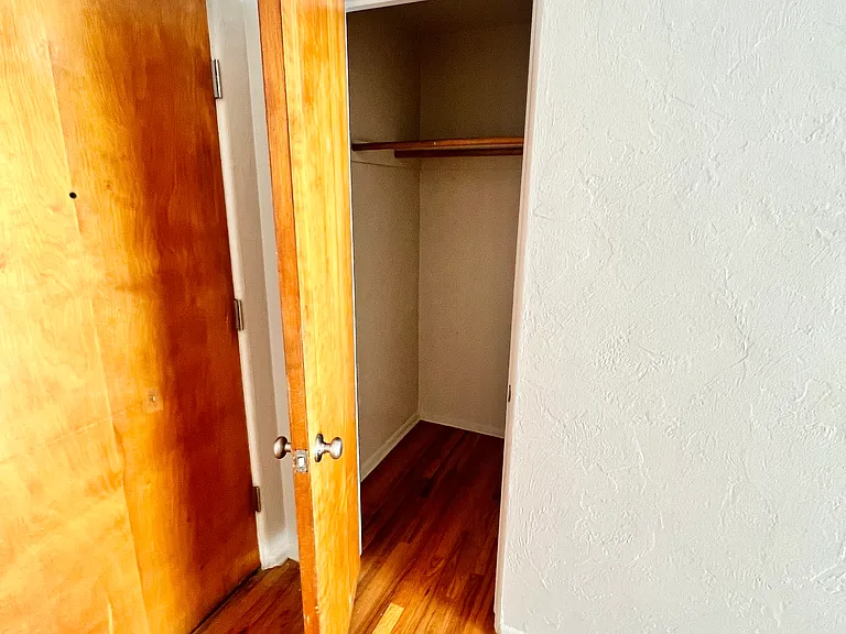 Explore this cozy closet space, perfect for organizing your wardrobe. Explore this cozy closet space, perfect for organizing your wardrobe.