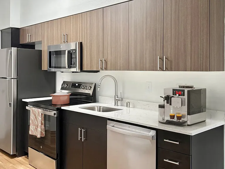 Explore this modern kitchen equipped with top-of-the-line appliances and sleek design. Explore this modern kitchen equipped with top-of-the-line appliances and sleek design.
