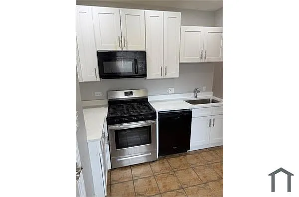 Building Photo - 6444 N Hamilton Ave #2E