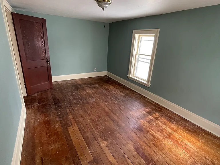 Original hardwood floors throughout entire upstairs, 3 bedrooms. Freshly painted.