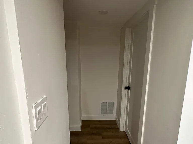 Hallway to bathroom and laundry room