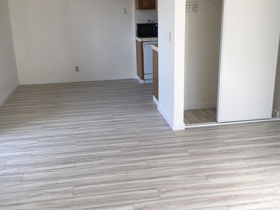 Breakfast nook area next to kitchen.
View of coat closet.