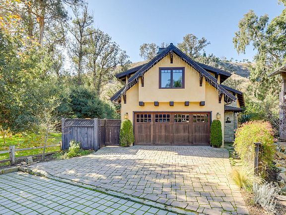 Garage will have space for one car. Two more fit in the driveway.