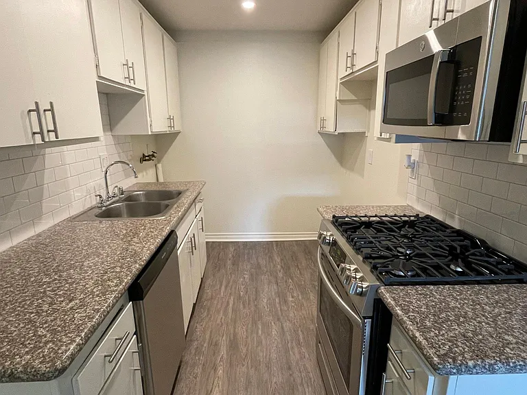 2bed+1.5bath Flat level Kitchen with granite countertops, recessed lighting, stainless steel appliances, and new microwave.
--
*Floor plans are digital renderings. All dimensions are approximate. Actual product and specifications may vary in dimension or