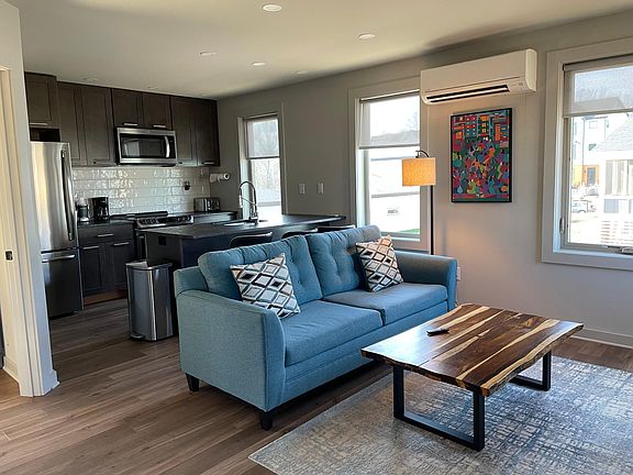 Pull out sofa. Solar shades. Adjustable HVAC unit.