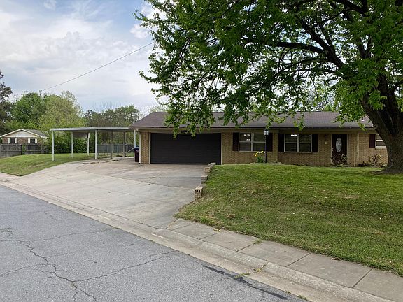 2 car garage & 2 car Carport