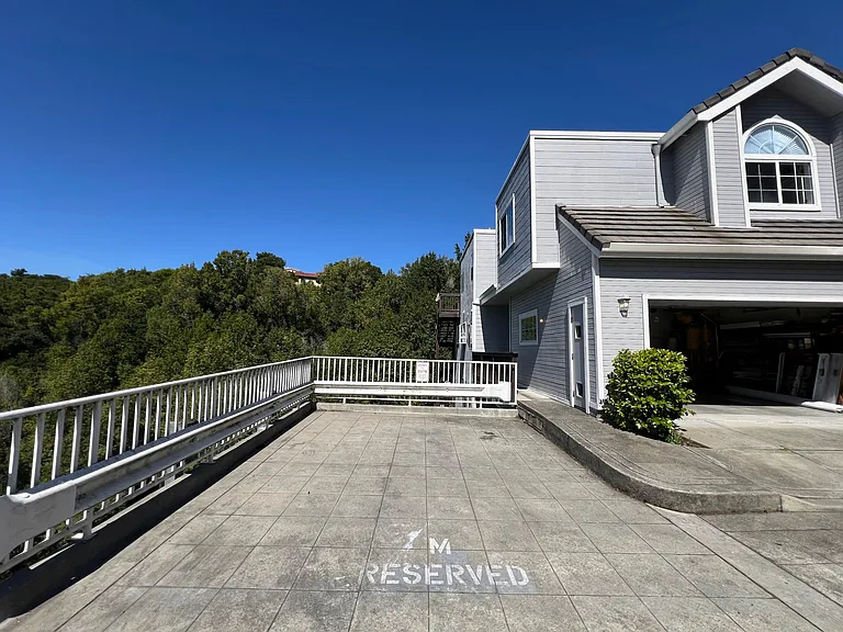 Dedicated parking space + 2 car garage. No other overnight street parking.