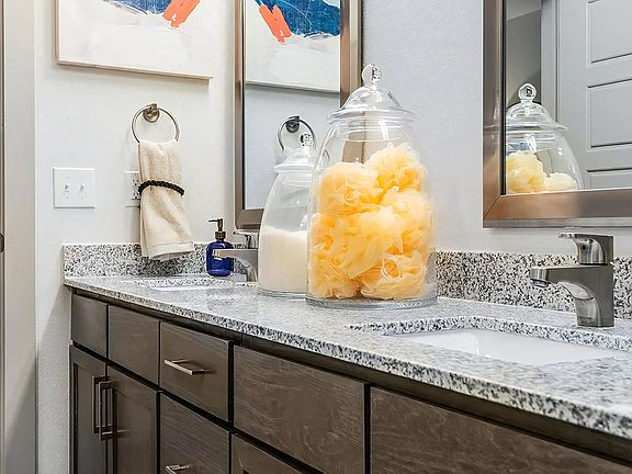 Elegant Granite-Topped Double Vanities with Undermount Sinks