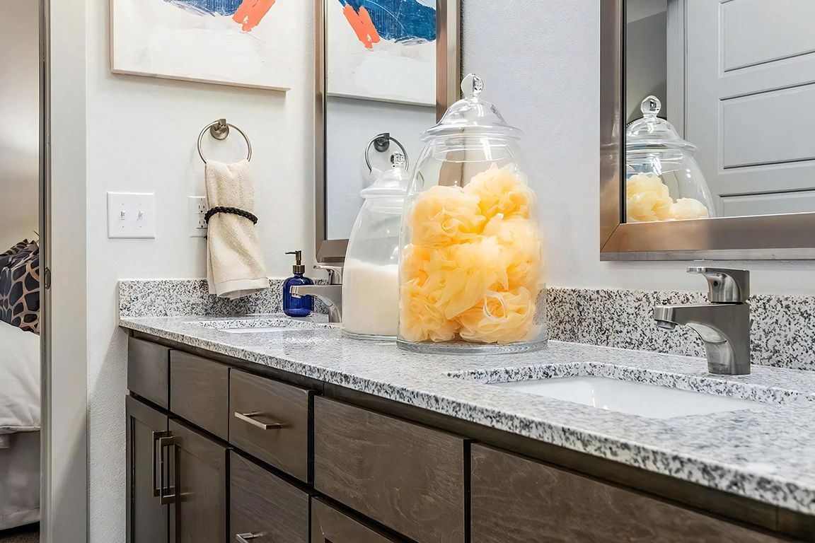 Elegant Granite-Topped Double Vanities with Undermount Sinks