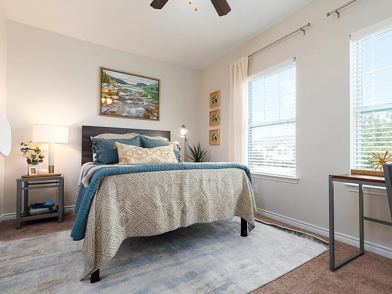 Relax in a Bright, Cozy Bedroom with Natural Light at Seaglass Apartments - Enjoy Corpus Christi Comfort