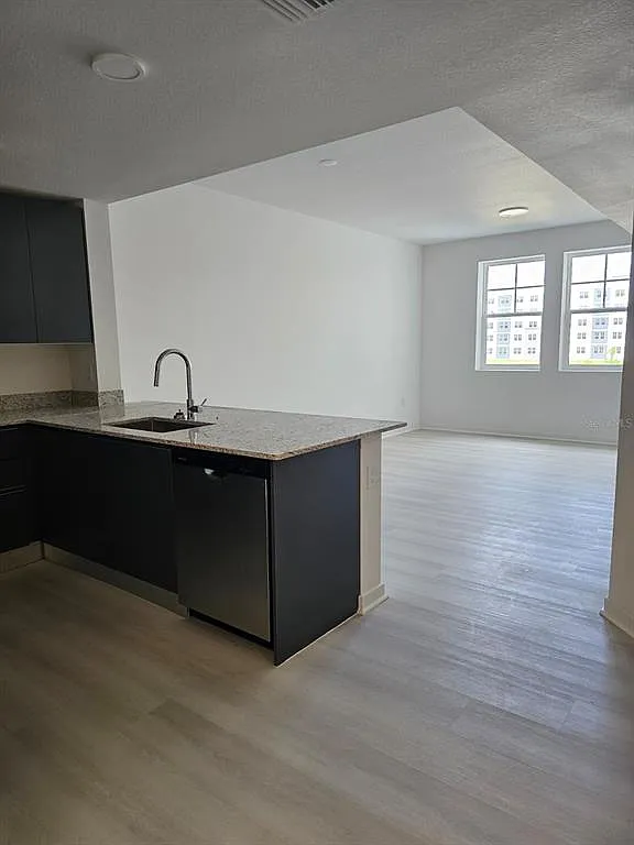 Building Photo - 5587 Millenia Park Blvd #215