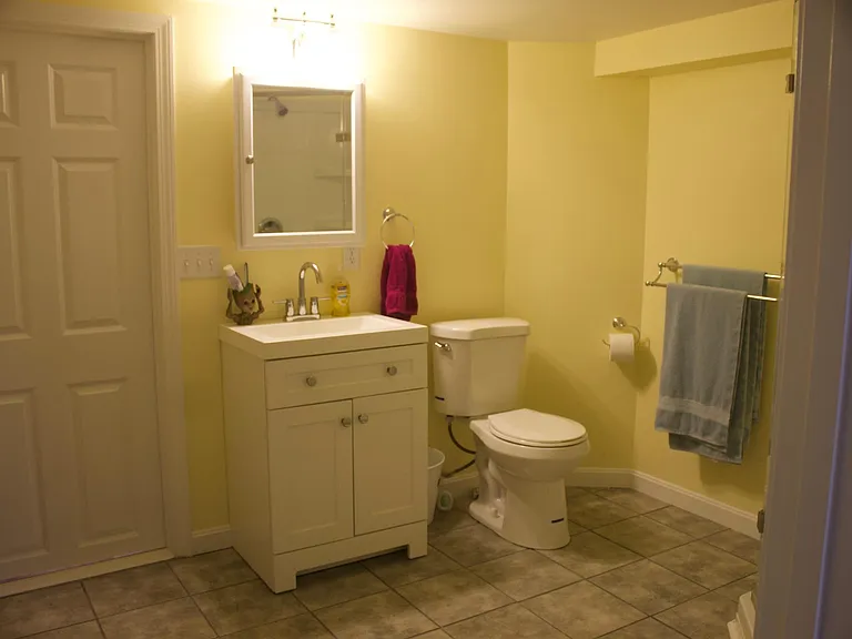 full bath off bedroom and laundry room