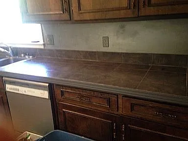 kitchen - tiled counter top, dish washer a