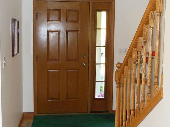 Upon entering the home through this vaulted entry you will notice the high level of care this home has received.  The gleaming wood floors and fresh paint are indicators of what the rest of the home holds for the new buyer.