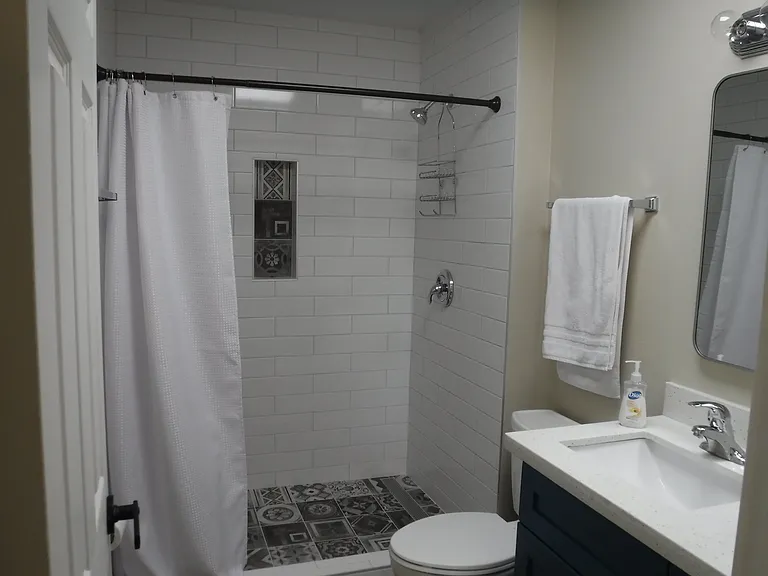 New tiled shower. Walk-in shower.