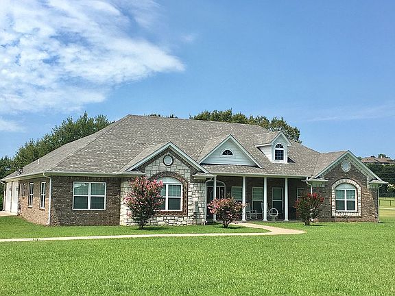 Home, shop on 4.67 ac m/l