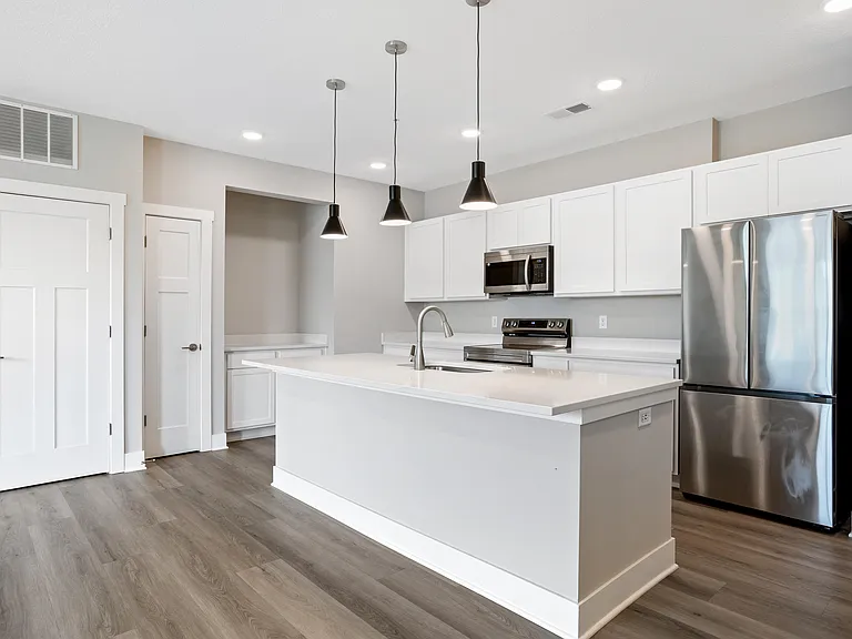 Kitchen with appliances of an apartment home.