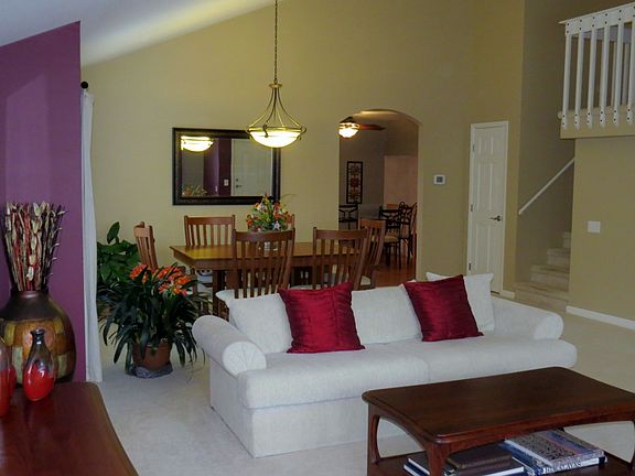 Vaulted ceilings in formal living and dining rooms