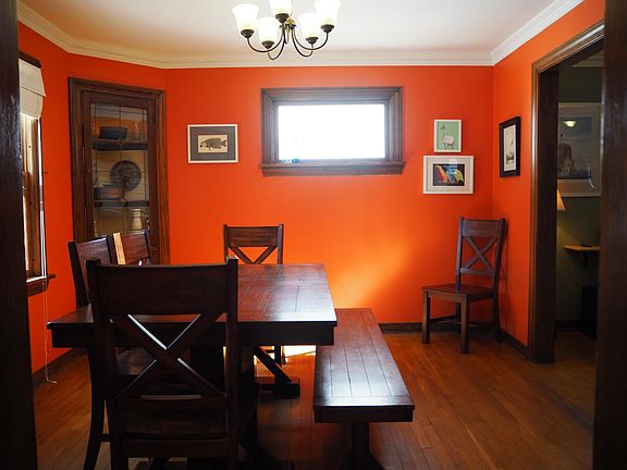 Dining room has been repainted blue.