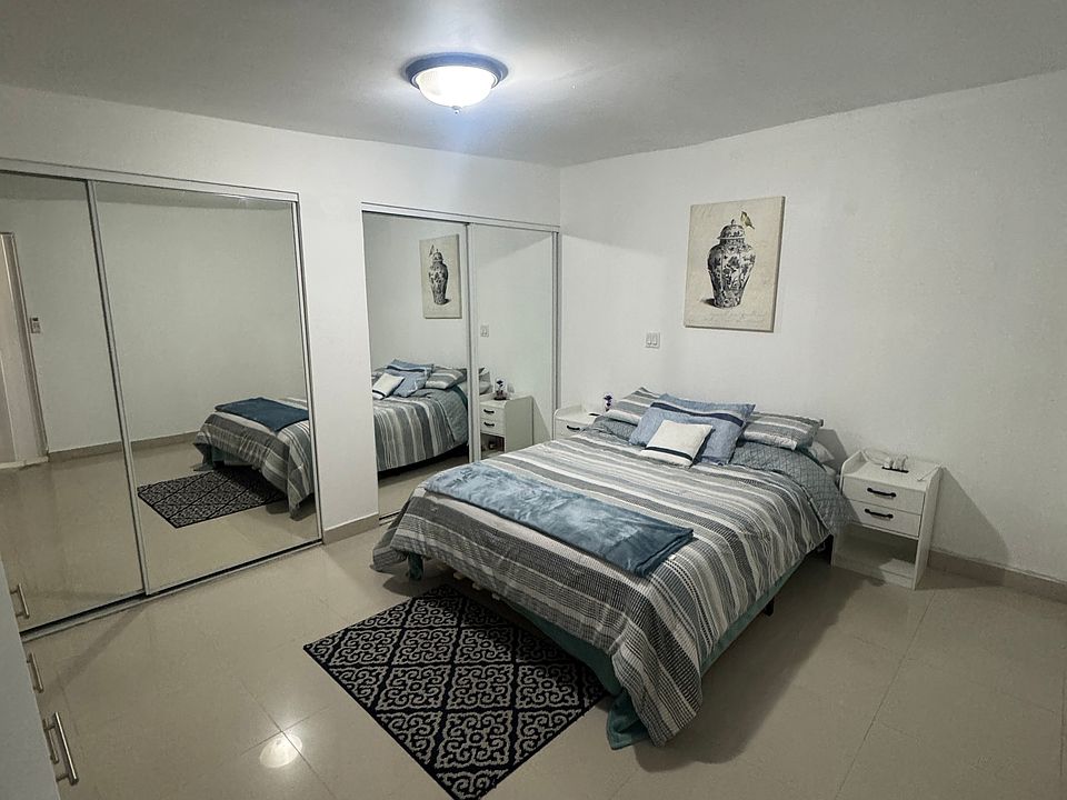 Big bedroom with wall to wall closet