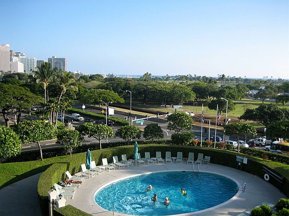 Pool with Ala Moana park and ocean in background.
