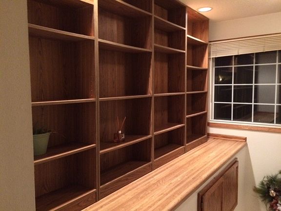 shelves off entryway stairs