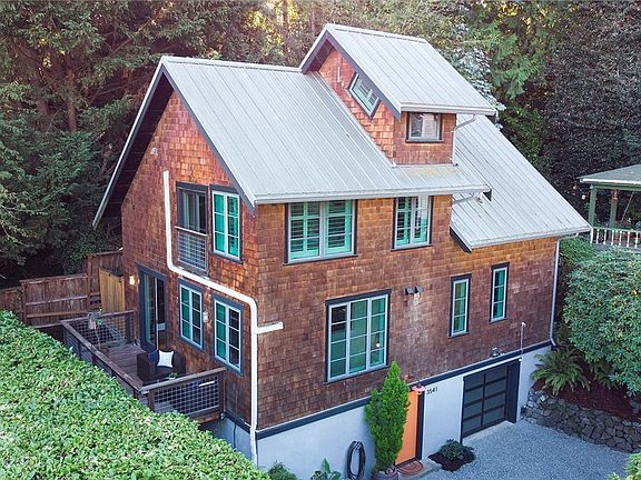 Secluded and private home just 2 blocks from Lake Washington. Notice the Crow's Nest office with views!