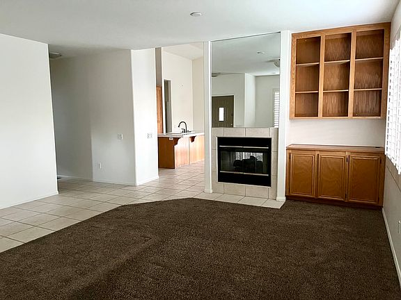 View front living room into kitchen