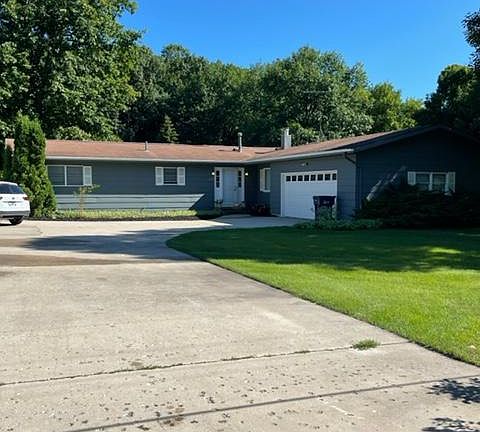 large driveway and 2 car garage