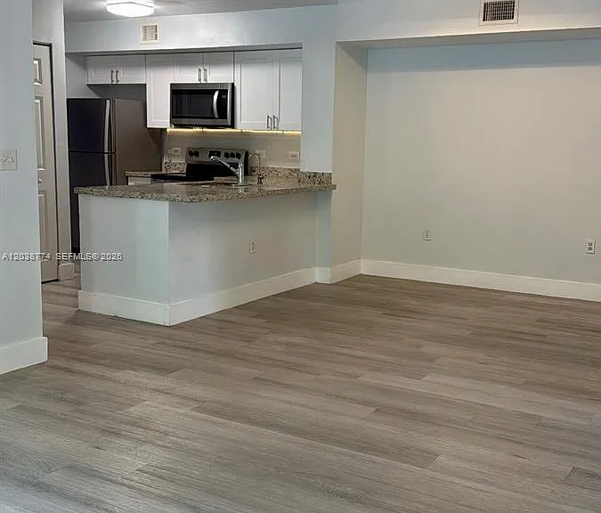 11155 SW 5th Pl #302 — Photo 2