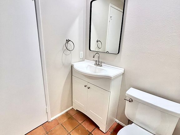 Half bathroom off of the living room.