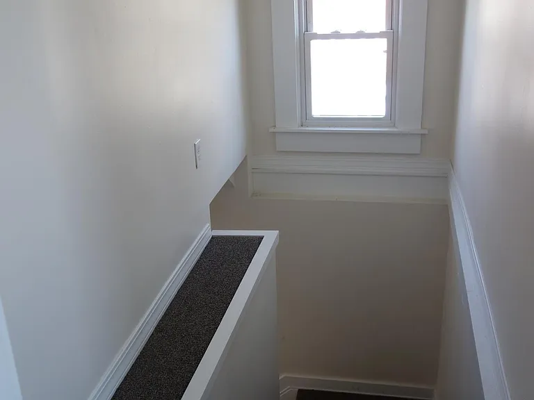 Bedroom 4 private stair well from family room