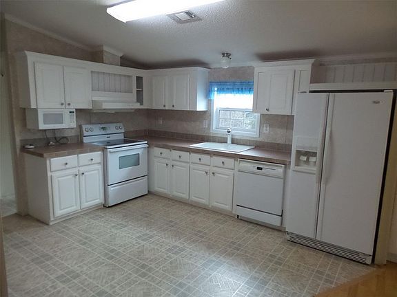 4th image of 7730 SE Fork River Dr