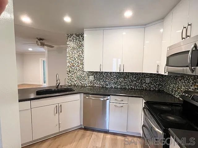 1st image of 7565 Charmant Dr Unit 411
