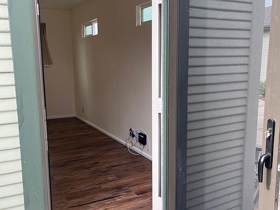 View of entryway and bedroom