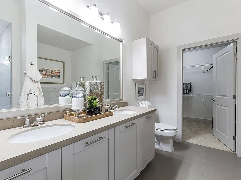 Dual-vanities and walk-in closets in select master bathrooms